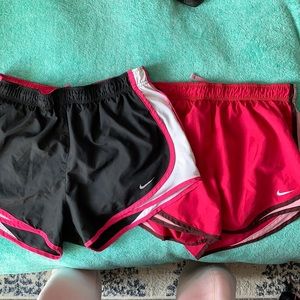 2 pairs of Nike running shorts